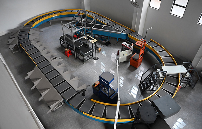 環(huán)型交叉帶分揀機(jī)的工作原理、特點(diǎn)及應(yīng)用